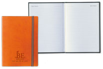 orange faux leather journal with elastic closure